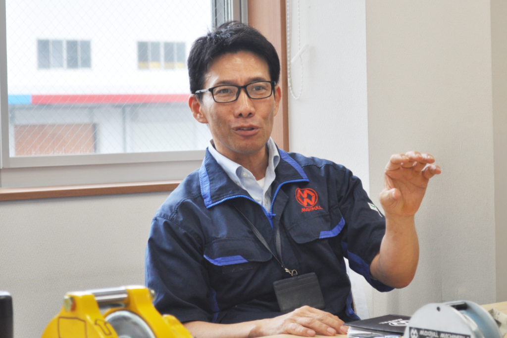 常務取締役 佐藤 様